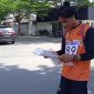 Terlihat Peserta Lomba Total Orienteering Tingkat Nasional Ke 7 mencari pos-pos melalui peta di kawasan perkotaan Palu. Foto : Sadam Likein.id